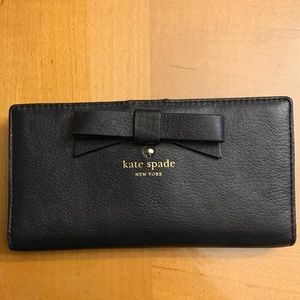 Black Kate Spade wallet with bow.